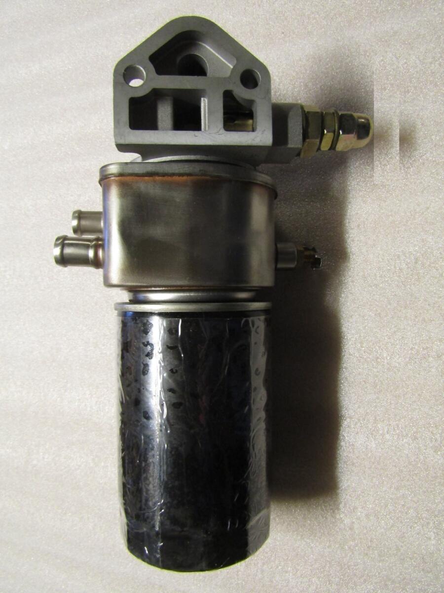 Фильтр масляный в сборе с кронштейном и радиатором масла TDL 36 4L/Оil filter, Assy Фильтр масляный в сборе с кронштейном и радиатором масла TDL 36 4L/Оil filter, Assy
